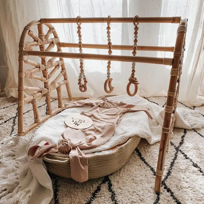 The Woven Wilde Rattan Baby Play Gym