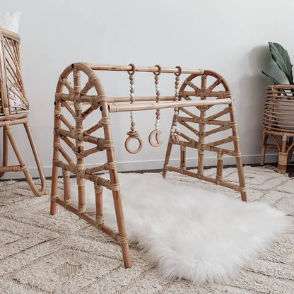 The Woven Wilde Rattan Baby Play Gym